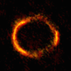 Illustration for article titled Gravitational Lens Creates A Perfect Einstein Ring Across The Universe